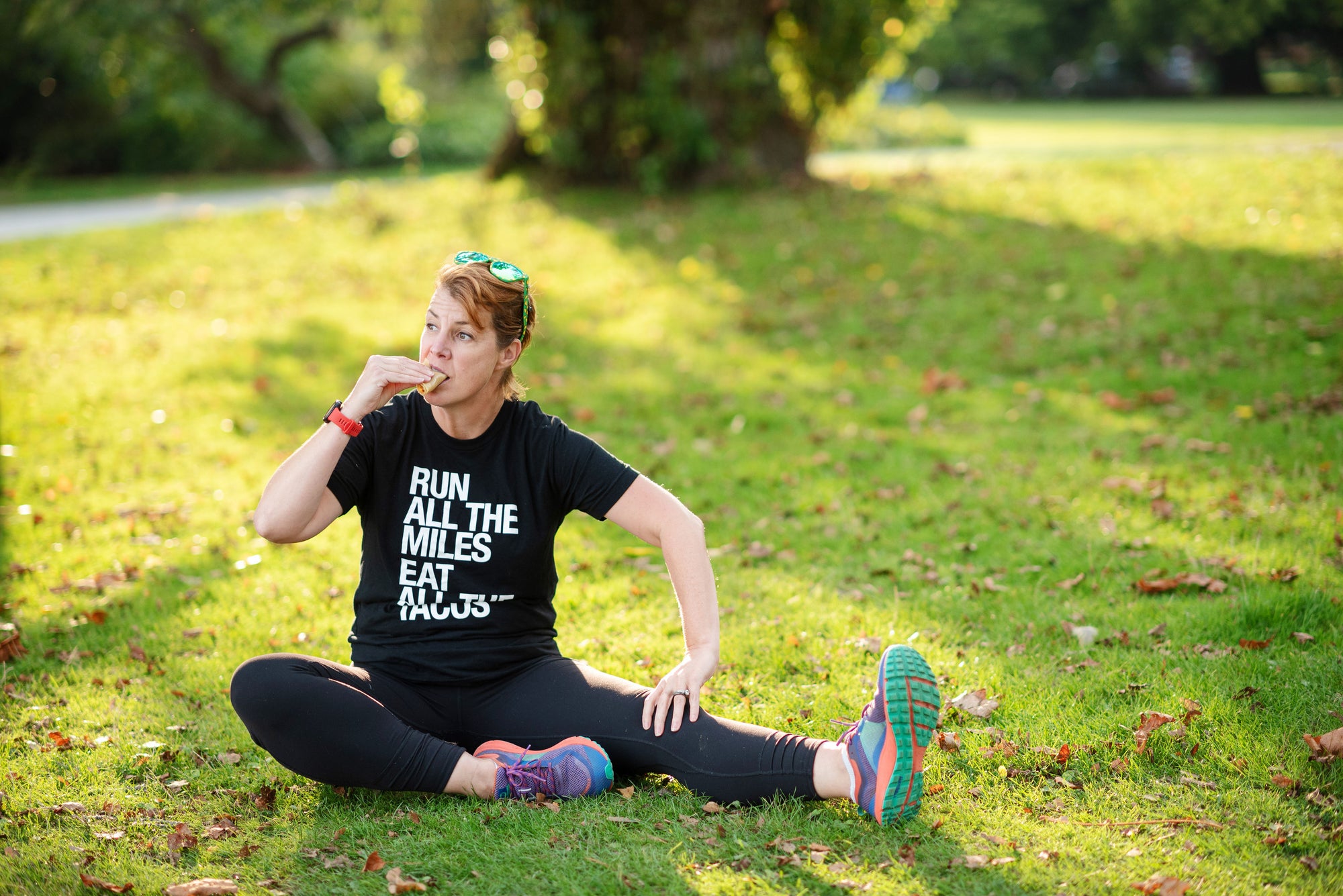 Coach Beth Baker (here eating a fish taco) is Chief Running Officer of Running Evolution